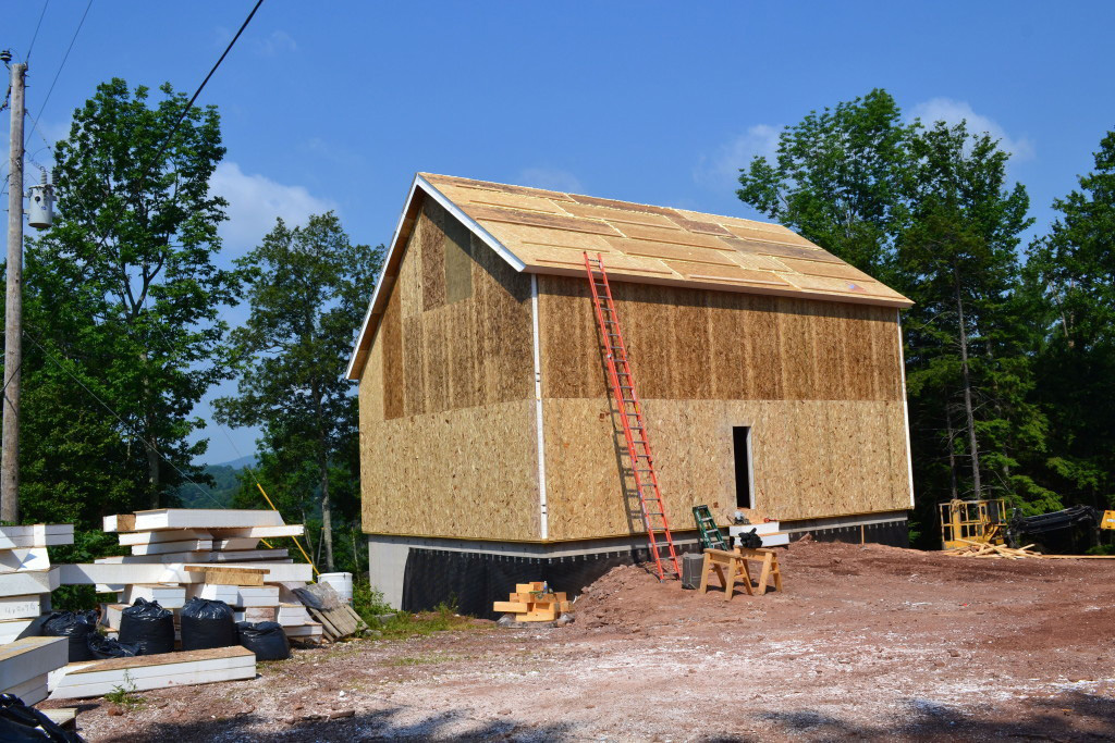 SIPs installation on a timber frame exterior
