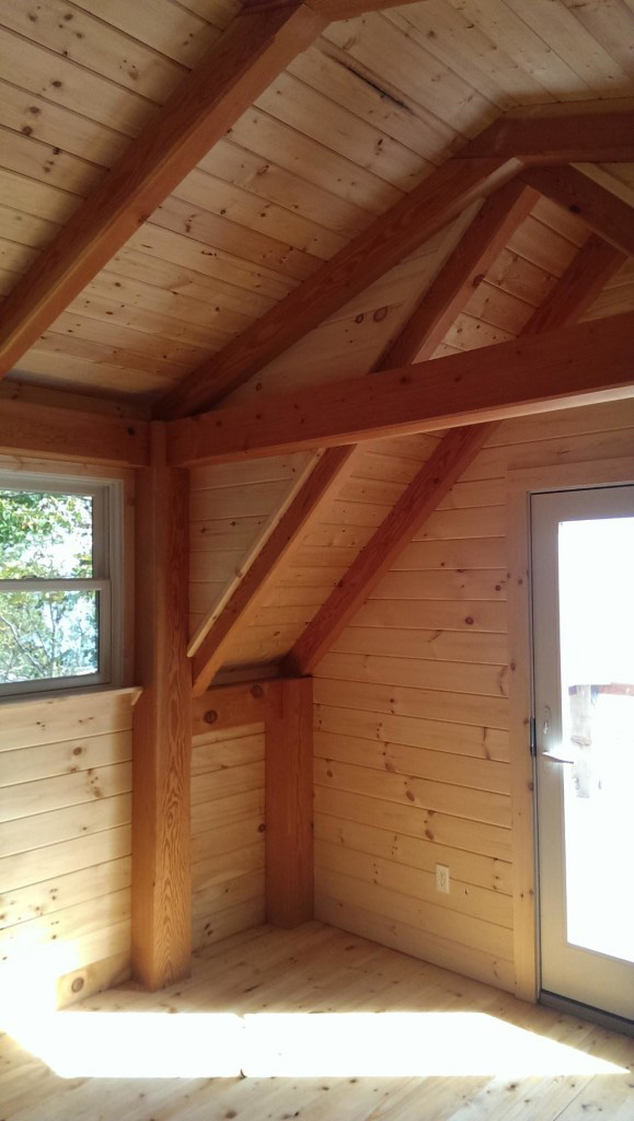Ceiling beams in a timber frame camp