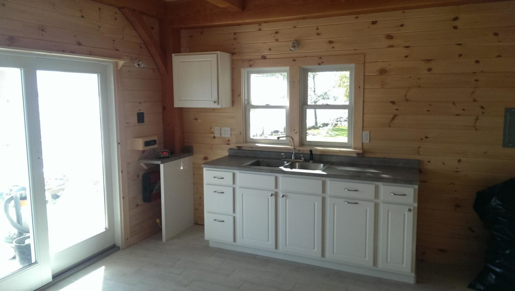 Kitchen area in a timber frame camp
