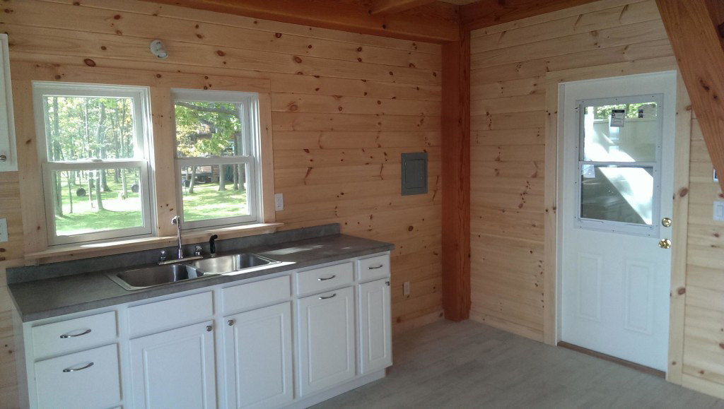Kitchen area in a timber frame camp