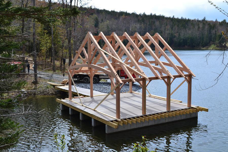 Timber frame pavilion structure on a lake