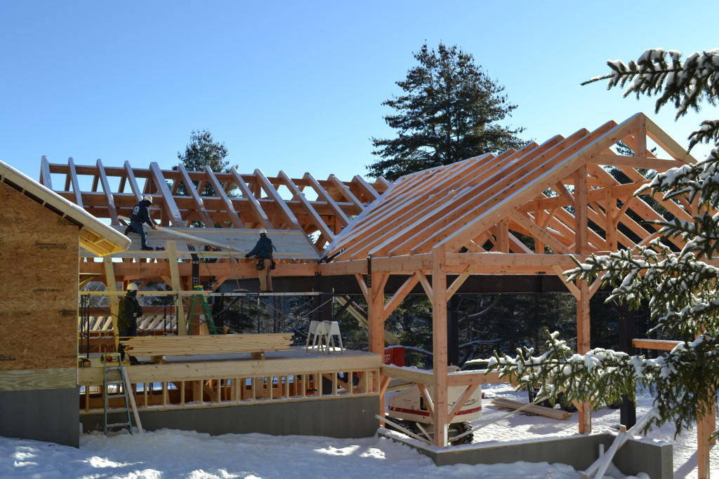Timber frame structure of a summer camp pavilion being built