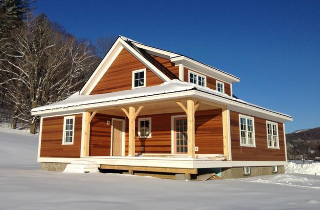 Finished exterior of a timber frame capeFinished exterior of a timber frame cape