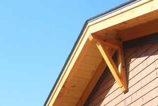 Finished exterior of a timber frame cape