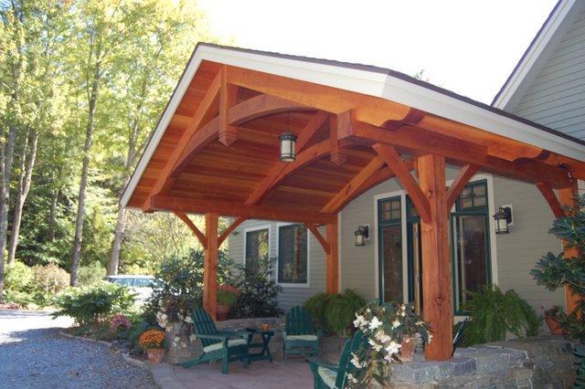 Large post and beam entry, with arched king post trusses. Hinesburg, Vermont.