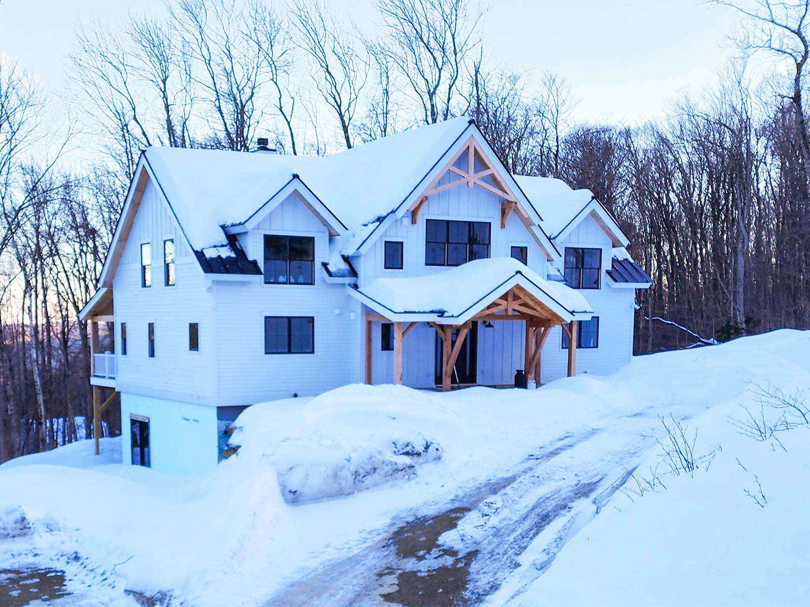 Timber frame cape with wings