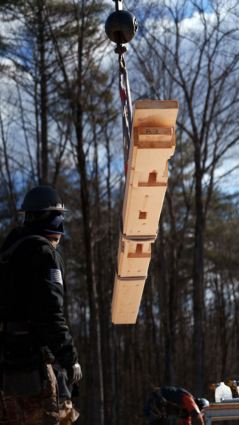 Timber being flown into place